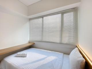 Spacious and Homey 2BR with Work Space at Meikarta Apartment By Travelio - 3