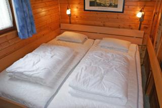 Blockhaus mit grossem Grundstück und Zaun - Damp - 3