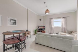 Waves - Spacious 1BR with Balcony & Cozy Interiors in JVC - Dubai - 2