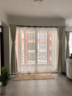 Secret Serenity - Modern, Stylish & Comfy 2 Bedroom Apartment With Workspace, Secure Parking, CCTV, Swimming Pool, Gym, And City Views in Nairobi - 1