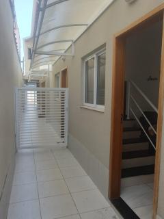 Casa com quintal em condomínio residencial - Praia Grande - 0
