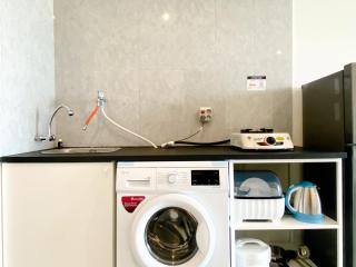 Simply Look Studio at Grand Kamala Lagoon Apartment By Travelio - 2