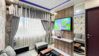 Cozy 2BR at Royal Makassar Apartment By Travelio - 1
