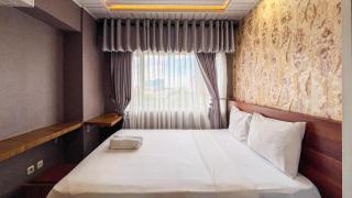 Cozy 2BR at Royal Makassar Apartment By Travelio - 8