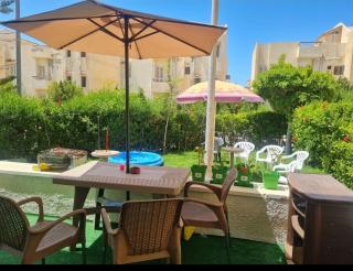 Garden chalet in vella in Badr resort north coast zahran mall - 6