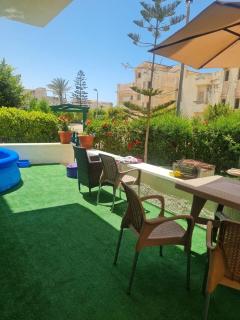 Garden chalet in vella in Badr resort north coast zahran mall - 4