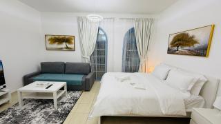 O07 Luxury Furnished Studio Apartment near bus stop Garden view Persia Cluster - Dubai - 9