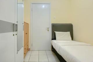 Good Deal and Well Design 2BR Green Pramuka City Apartment By Travelio - 6