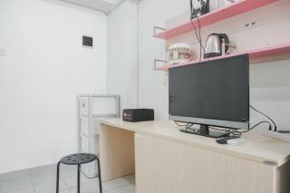Nice and Cozy Living 2BR at Green Pramuka City Apartment By Travelio - 1