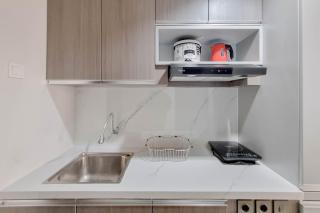 Homey and Scenic Studio at Patraland Amarta Apartment By Travelio - 2