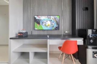 Homey and Scenic Studio at Patraland Amarta Apartment By Travelio - 4