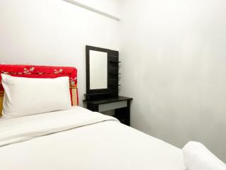 Warm and Cozy 2BR Mutiara Bekasi Apartment By Travelio - 4