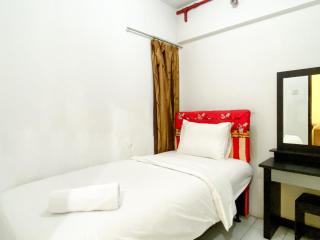 Warm and Cozy 2BR Mutiara Bekasi Apartment By Travelio - 6