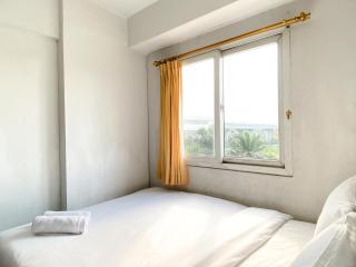Warm and Cozy 2BR Mutiara Bekasi Apartment By Travelio - 7