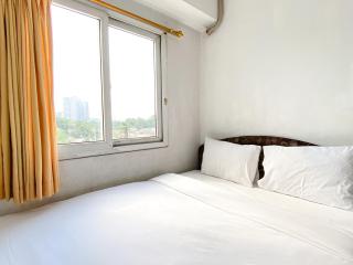 Warm and Cozy 2BR Mutiara Bekasi Apartment By Travelio - 0