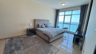 SeaView Beachfront with pool,sauna,jacuzzi,gym,cafe - Ajman - 1