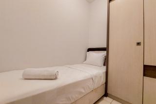Cozy Living and Tidy 2BR Serpong Greenview Apartment By Travelio - 7