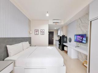 Good and Cozy Studio at Patraland Amarta Apartment By Travelio - 7