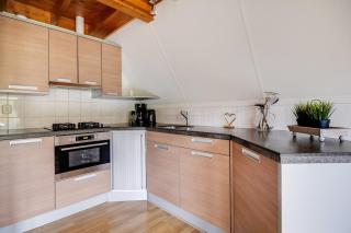 Heggenmus I Huisje met Haard in de Tuin - 2