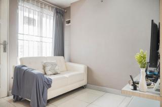 Warm and Homey 1BR at Teluk Intan Apartment By Travelio - 6