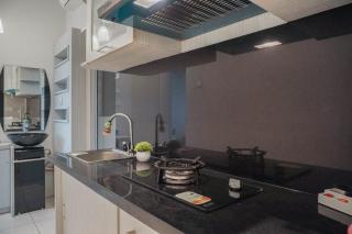 Warm and Homey 1BR at Teluk Intan Apartment By Travelio - 2