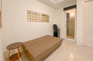 1BR with Direct Access to Pool at Parahyangan Residence Apartment By Travelio - 1