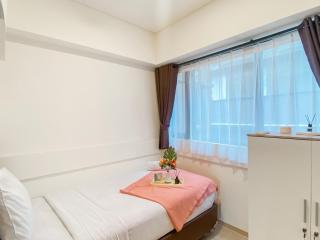 Homey and Spacious 2BR at Meikarta Apartment By Travelio - 5