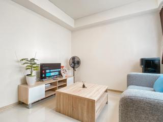 Homey and Spacious 2BR at Meikarta Apartment By Travelio - 1