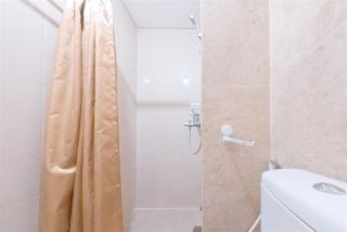 Homey Studio at Transpark Bintaro Apartment By Travelio - 1
