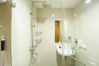 Homey and Nice 1BR at Gateway Park LRT City Bekasi Apartment By Travelio - 1
