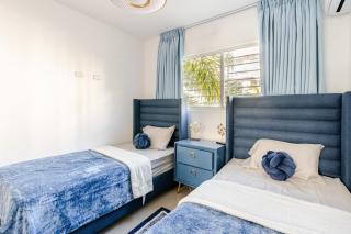 Chic Urban Retreat with Pool, Gym, & Free Parking - Santiago de los Caballeros - 7