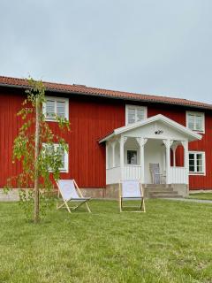 Red Wooden Cabin In Småland With Unexplored Forest - - 0