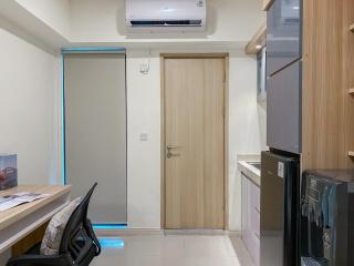 Good Place and Homey Studio Meikarta Apartment By Travelio - 1