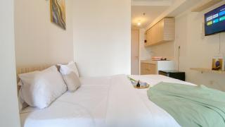 Warm and Simply Look Studio Apartment Tokyo Riverside PIK 2 By Travelio - 6