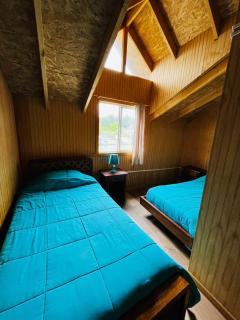 Habitación con 2 camas individuales en Hostal Taitai Las Cascadas - Puerto Octay - 3