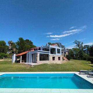 Casa en Villa Carlos Paz con pileta y vista al Lago IG alquilervillacarlospaz - 9