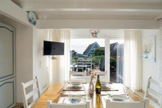 Am-hohen-Ufer-Reetdach-Haus-Happy-Haus - 4