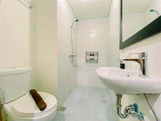 Warm and Homey Studio at Royal Sentul Park Apartment By Travelio - 1
