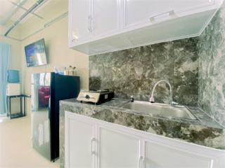Warm and Homey Studio at Royal Sentul Park Apartment By Travelio - 3