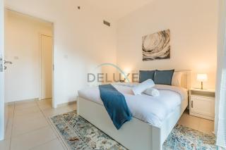 Balcony Overlooking the Swimming Pool, Just Minutes from the Park, Town Square Safi 1A, Al Yelayiss 2 by Deluxe Holiday Homes - 5