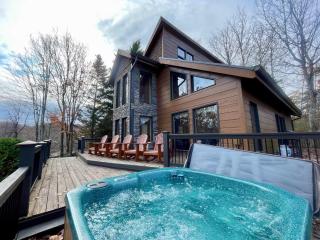 Stunning 2 bedroom with a hot tub and fireplace in an exclusive gated community! - 0