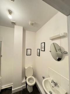 Sleek City-Center Apartment - 4