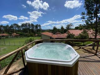 Chalé rústico no bosque jacuzzi lareira e ar - 4