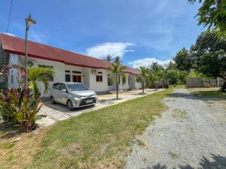 RedDoorz Syariah at Home Ampana Guest House Ampana Kota - Dondo - 0