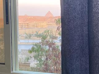 Pyramids view - ‘Ezbet `Abd el-Ḥamîd - 9