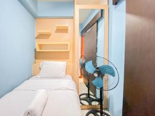 Homey Living 2BR at Jarrdin Cihampelas Apartment By Travelio - 9