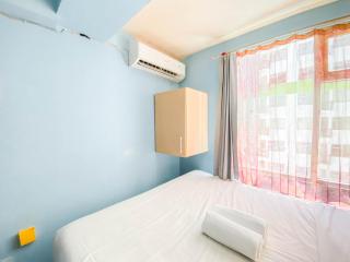 Homey Living 2BR at Jarrdin Cihampelas Apartment By Travelio - 1