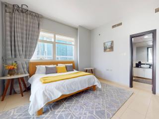 Stylish 2BR Apartment Steps from Metro and Marina Mall - 1