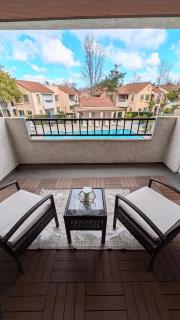 Poolside 2BR Condo with Balcony - 9