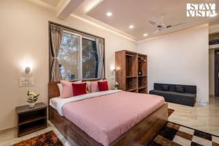 Serenity Skies Apartment with Pool by VEO - Part of StayVista - 5